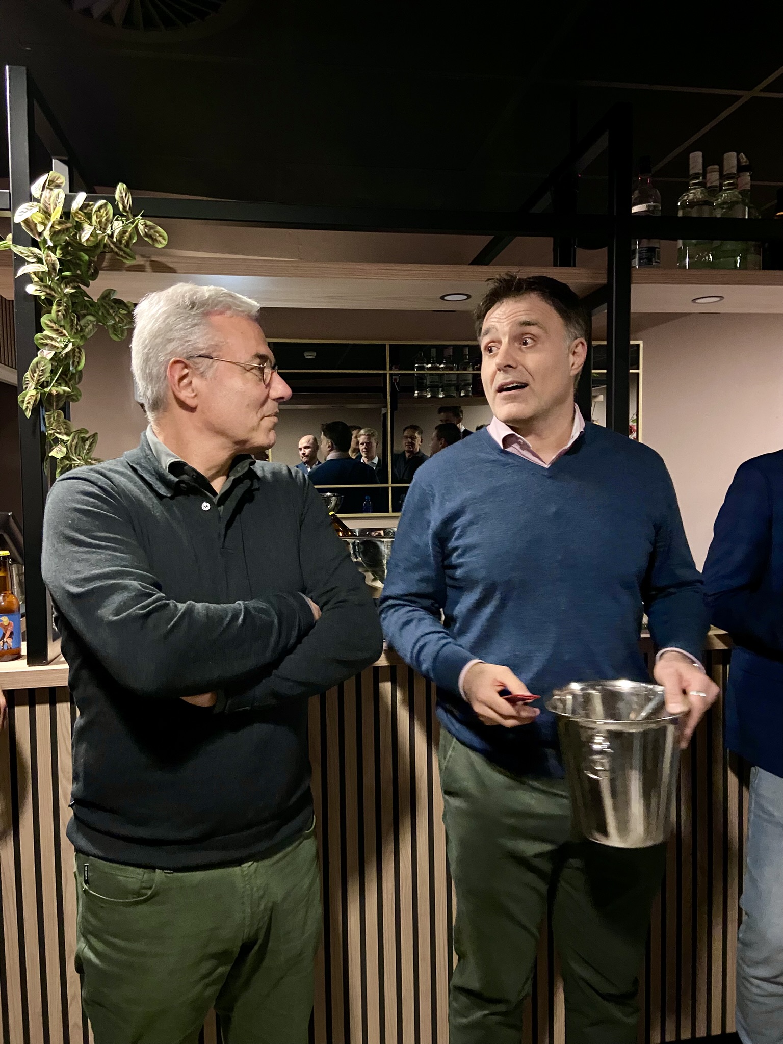 Two men doing a speech at customer event